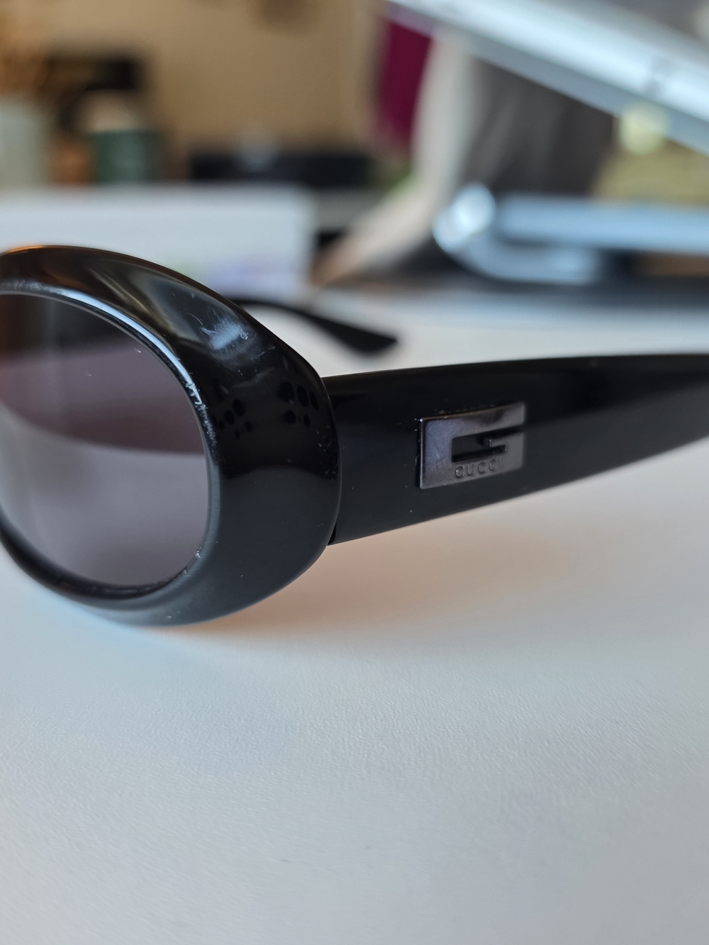 Gucci Black Oval Sunglasses with Temple Logo Plaque 2419/N